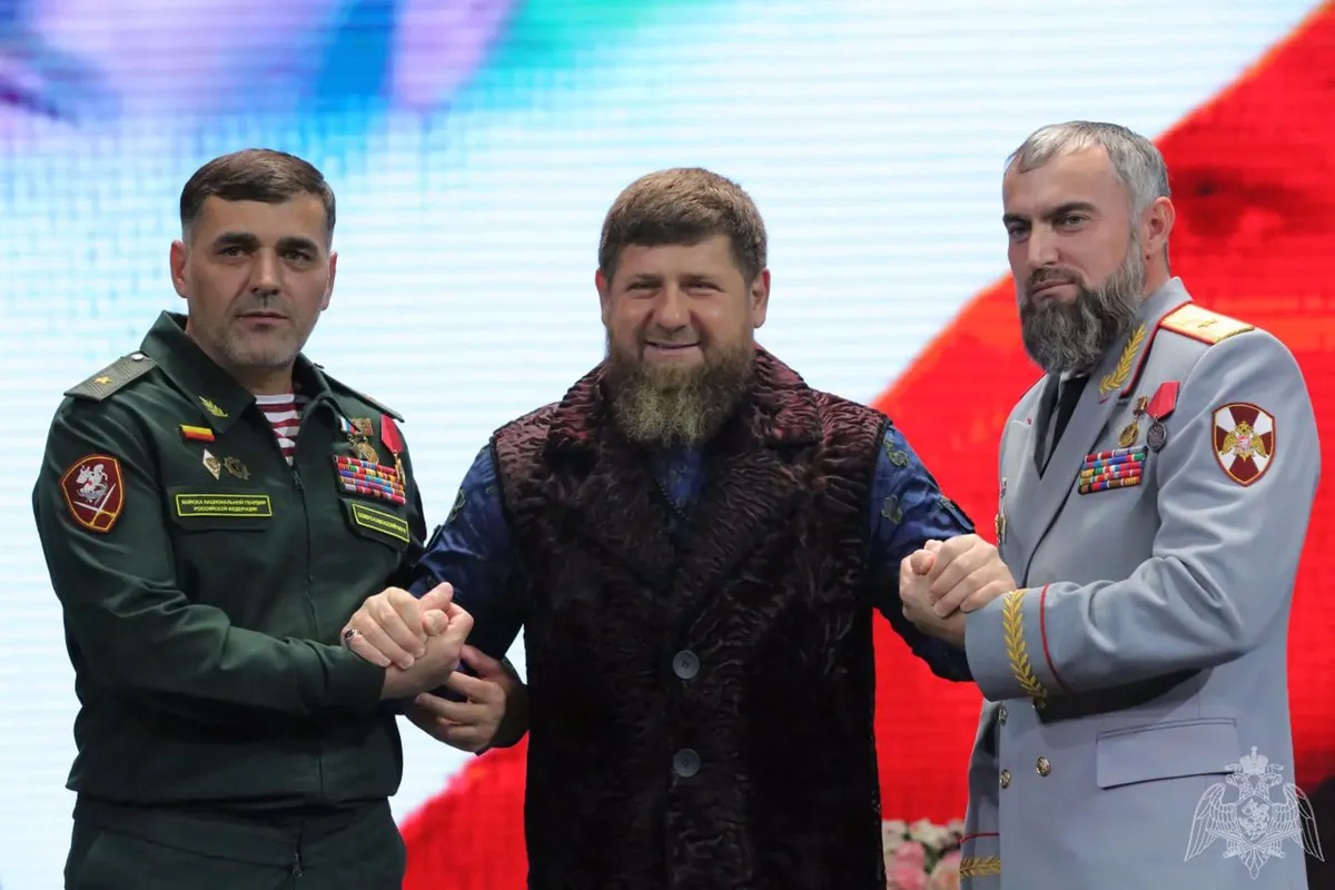 Alibek Delimkhanov, Ramzan Kadyrov, and Sharip Delimkhanov celebrate Rosgvardia Day