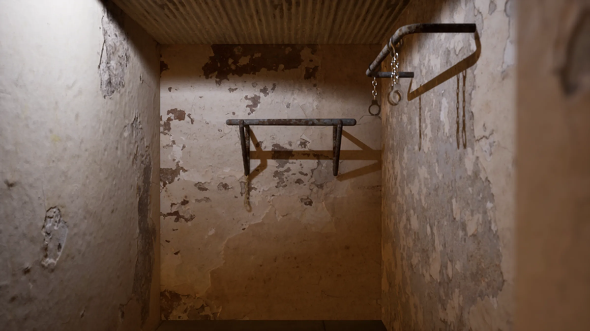 3D model of one of the torture chambers where prisoners were brutally beaten. Some of them had their hands tied and were hung upside down on a bar