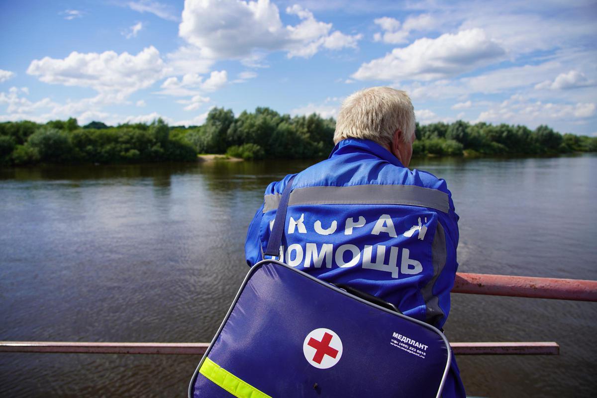 Paramedic Valery Volchenkov sails on the ferry from "Mayak" after the shift
