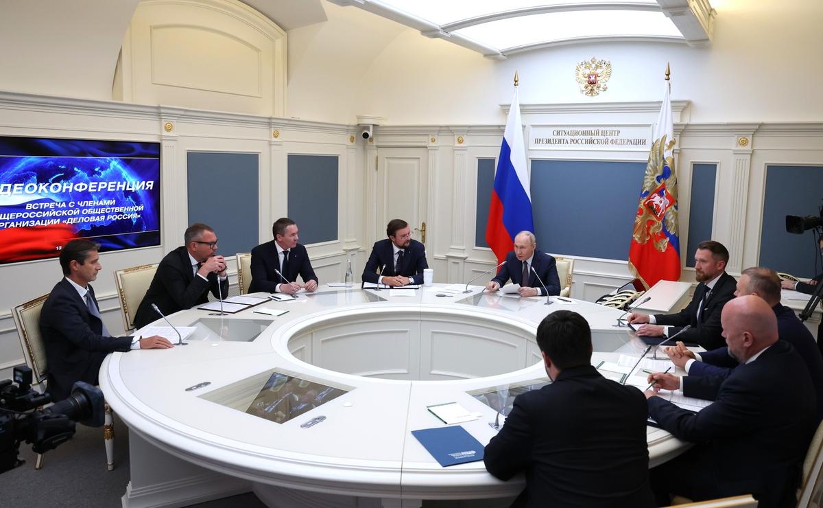 That very meeting. Aleksei Repik — to the left of Putin