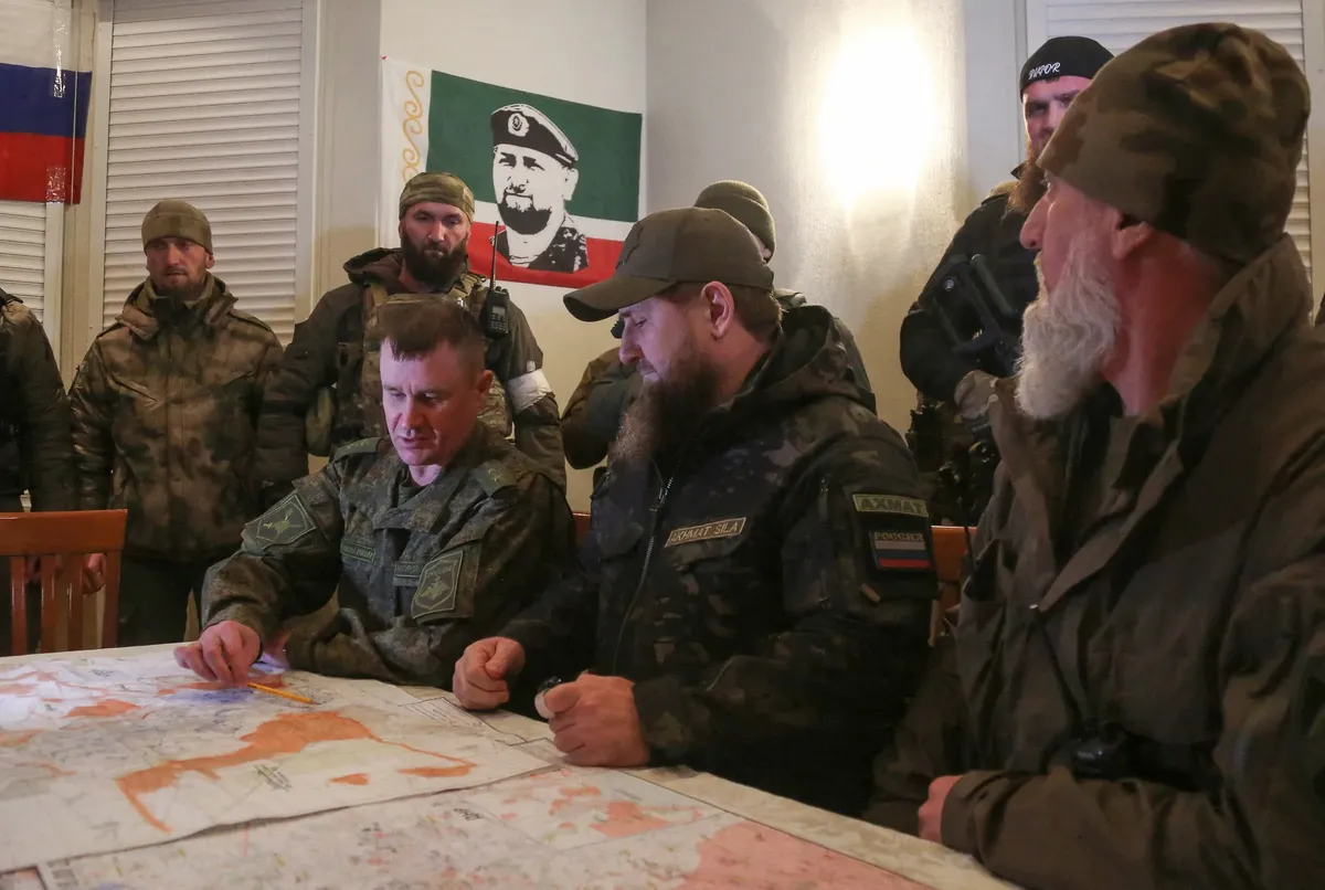 Ramzan Kadyrov (in the middle) listens to a report from Andrey Mordvichev, commander of the 8th Guards Combined Arms Army